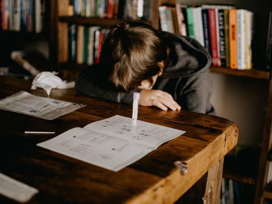 teen boy studying at home